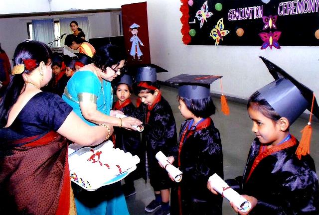 The student receiving their Graduation Certificates at the hands of the Chief Guest      Mrs.Madhavi Godbole.  