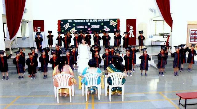   The students of H.k.G. Aster rejoicing with their Class Teacher Mrs. N.F.Pathan.