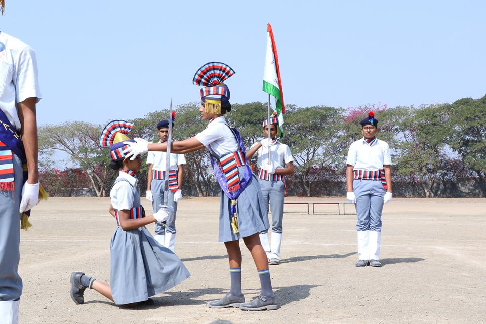 Vasundhara Dhumal, School Captain, handing over the charge to School Vice-Captain, Tanishka Pingale.