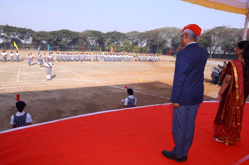  The Chief Guest, Col. Nambiar RMR saluting National Flag